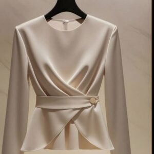 The Ivory Sculpted Peplum Top